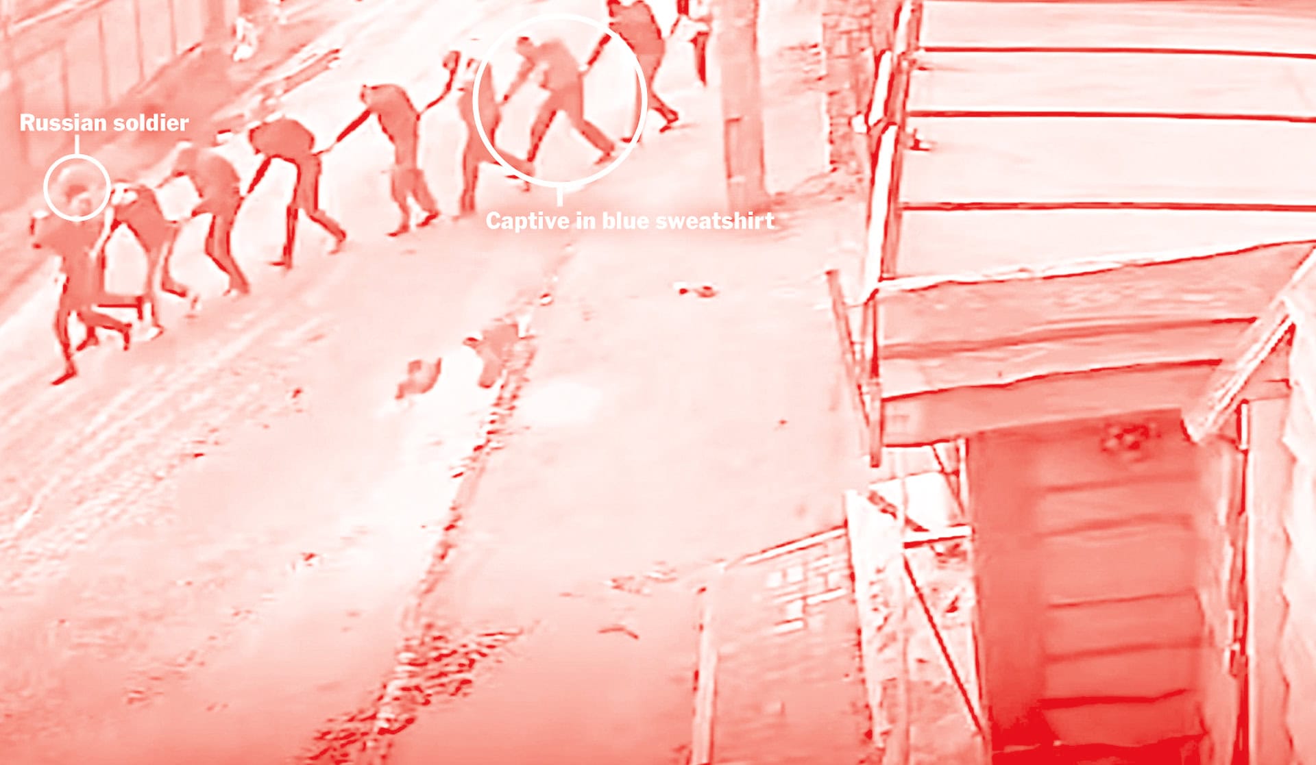 Security camera footaga filmed on Yablunska Street in Bucha, Ukraine, on March 4, 2022, shows Russian paratroopers marching nine men to the parking lot of an office building they had taken as a base. (via The New York Times)
