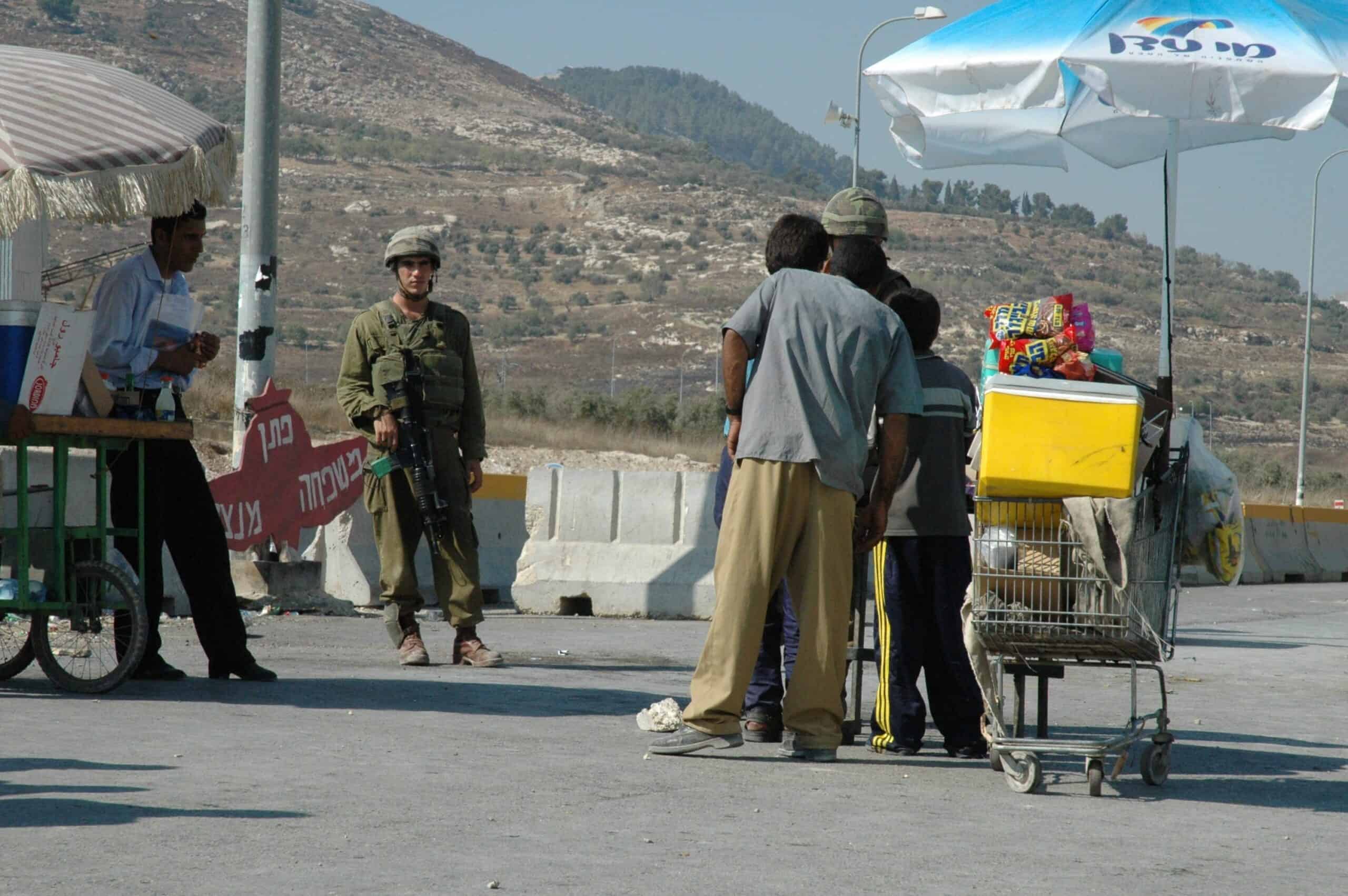 Selling drinks near checkpoint
