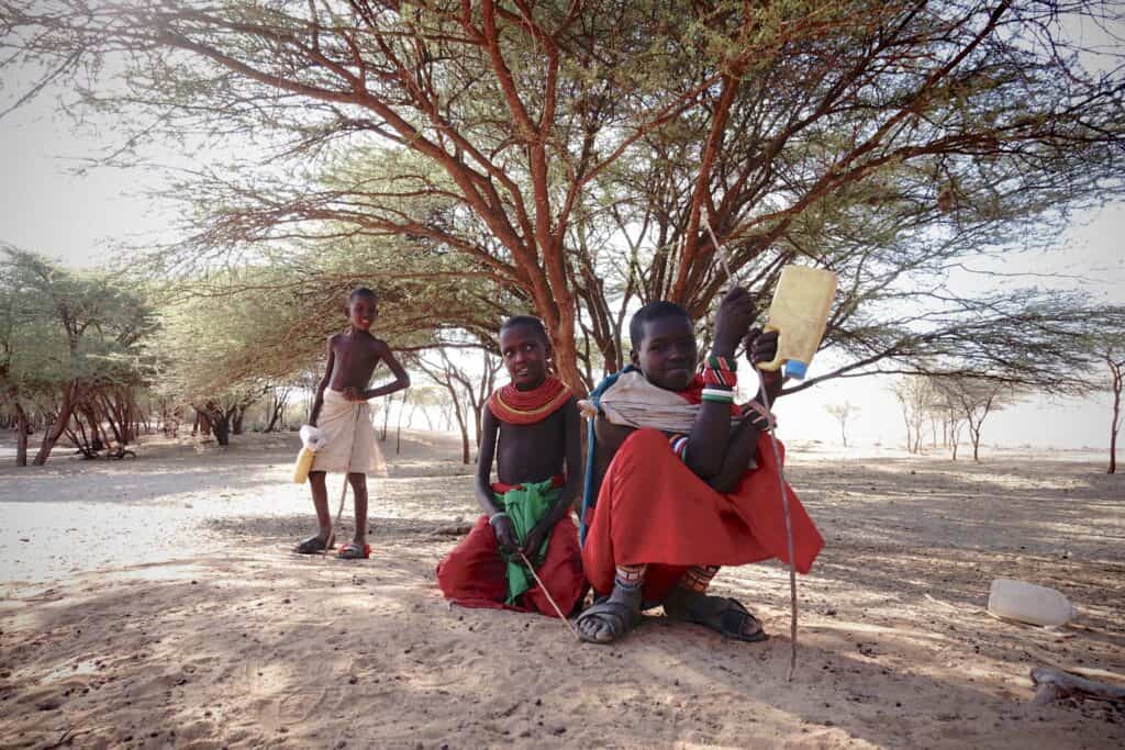Turkana children taking their goats to the well.jpg