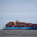The Maersk Line Container Ship Maersk Sentosa Is Helped By Tugs As It Navigates The River Mersey In Liverpool