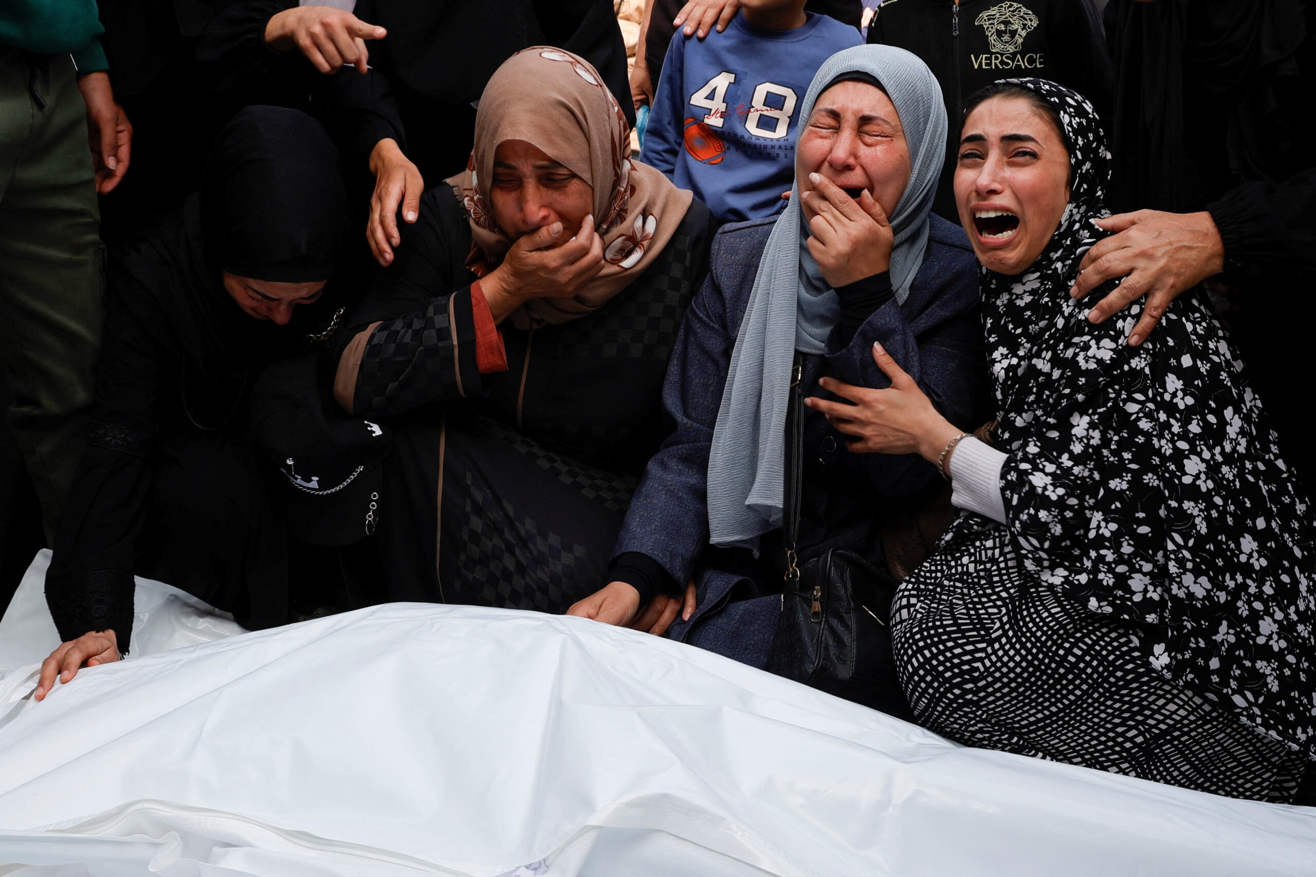 Palestinians mourn loved ones killed in israeli strikes