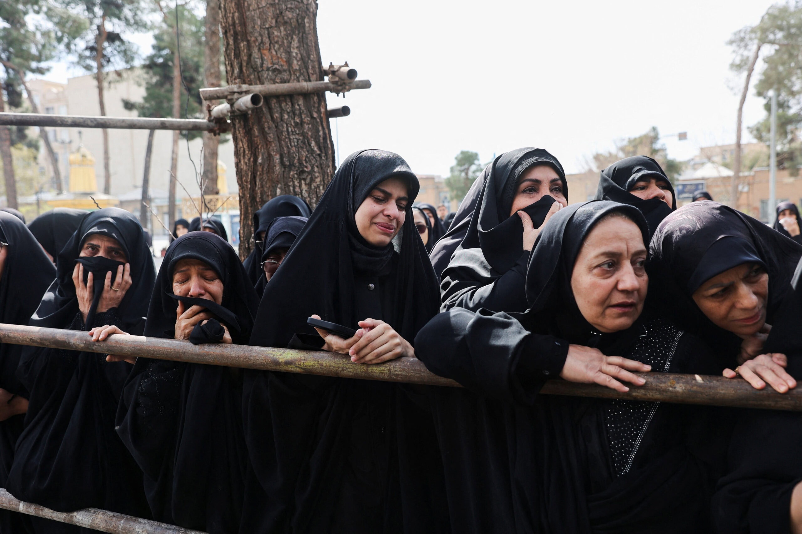 People attend the funeral of Zainab Sahebi, a two year old child who was killed in a strike, amid the U.S. Israeli conflict with Iran, in Tehran